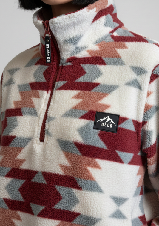 The Trek fleece in Wine aztec