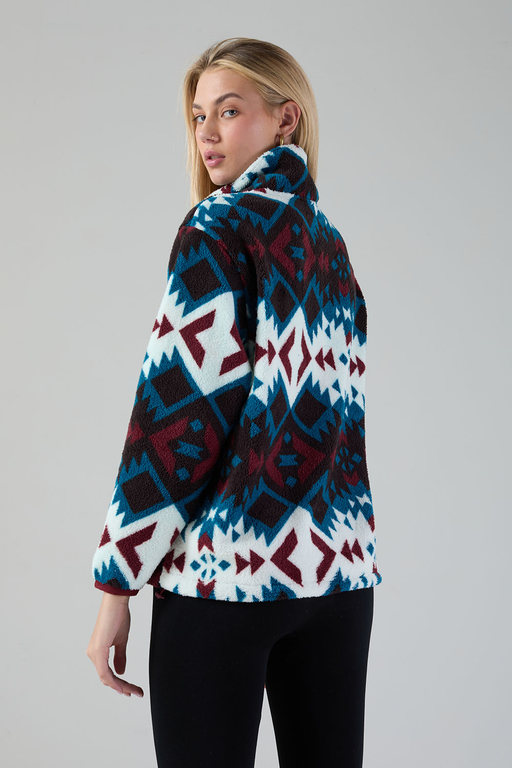 Molly Fleece In red Aztec