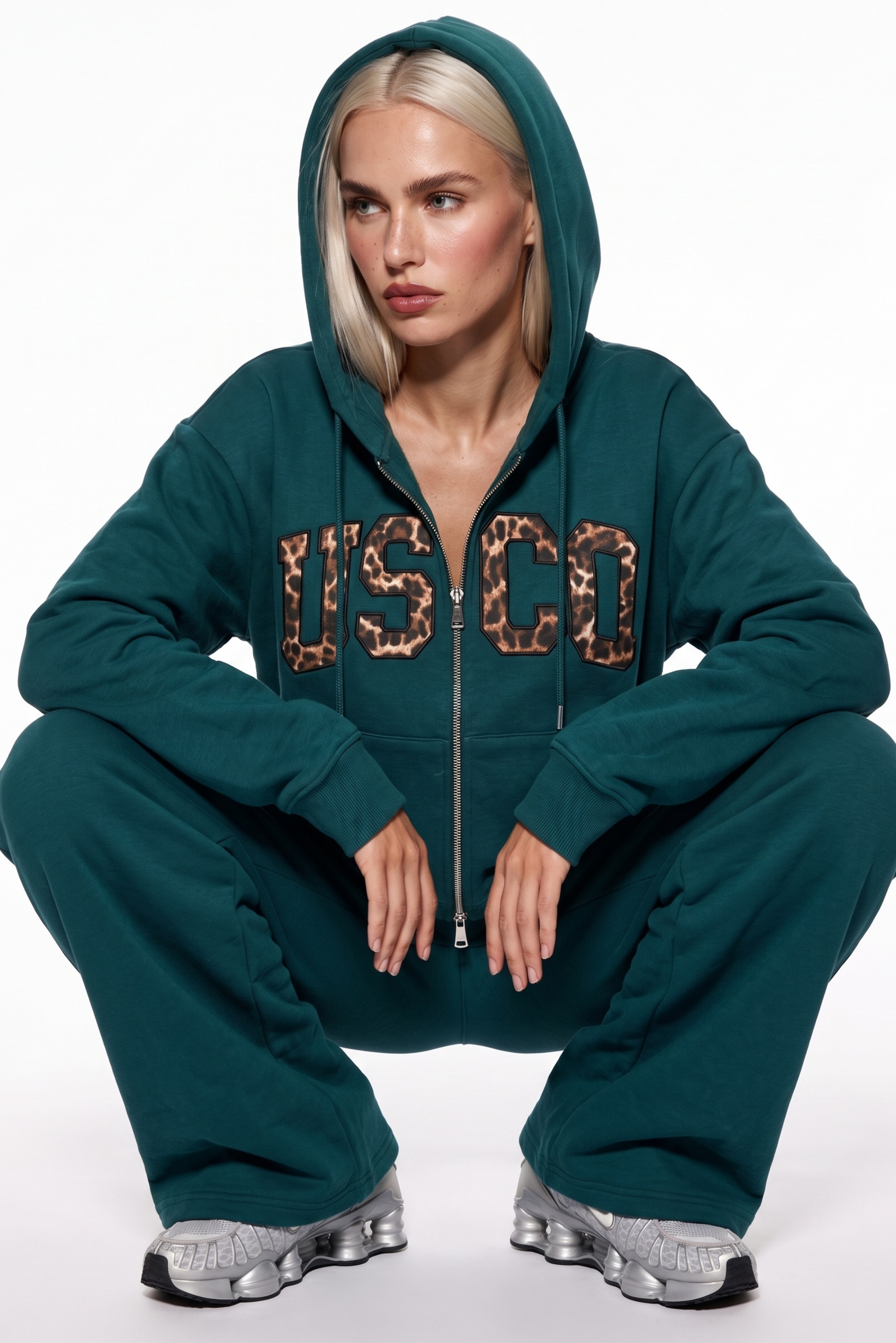 THE UNTAMED TRACKSUIT IN TEAL