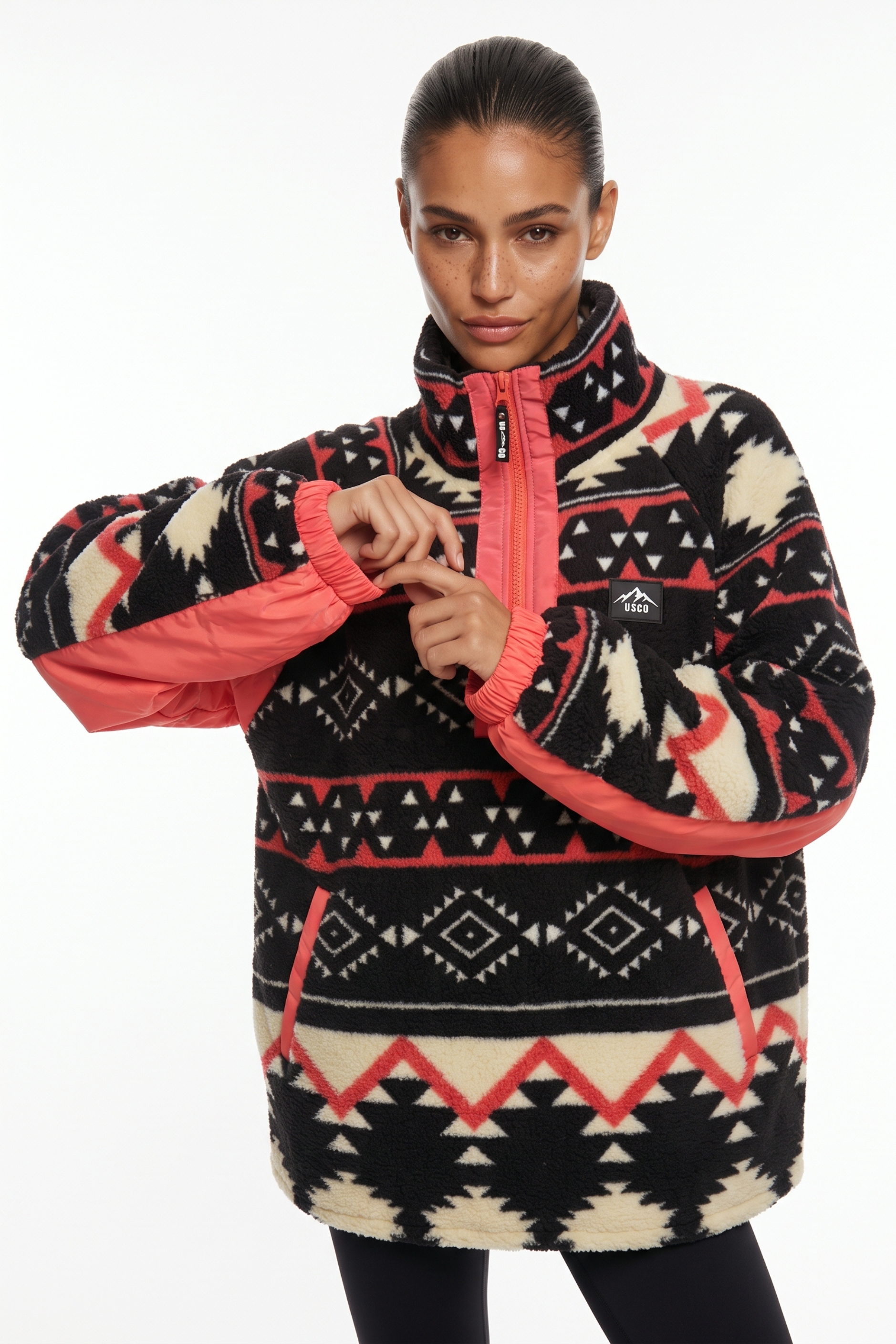 THE ARCTIC FLEECE IN CORAL AZTEC