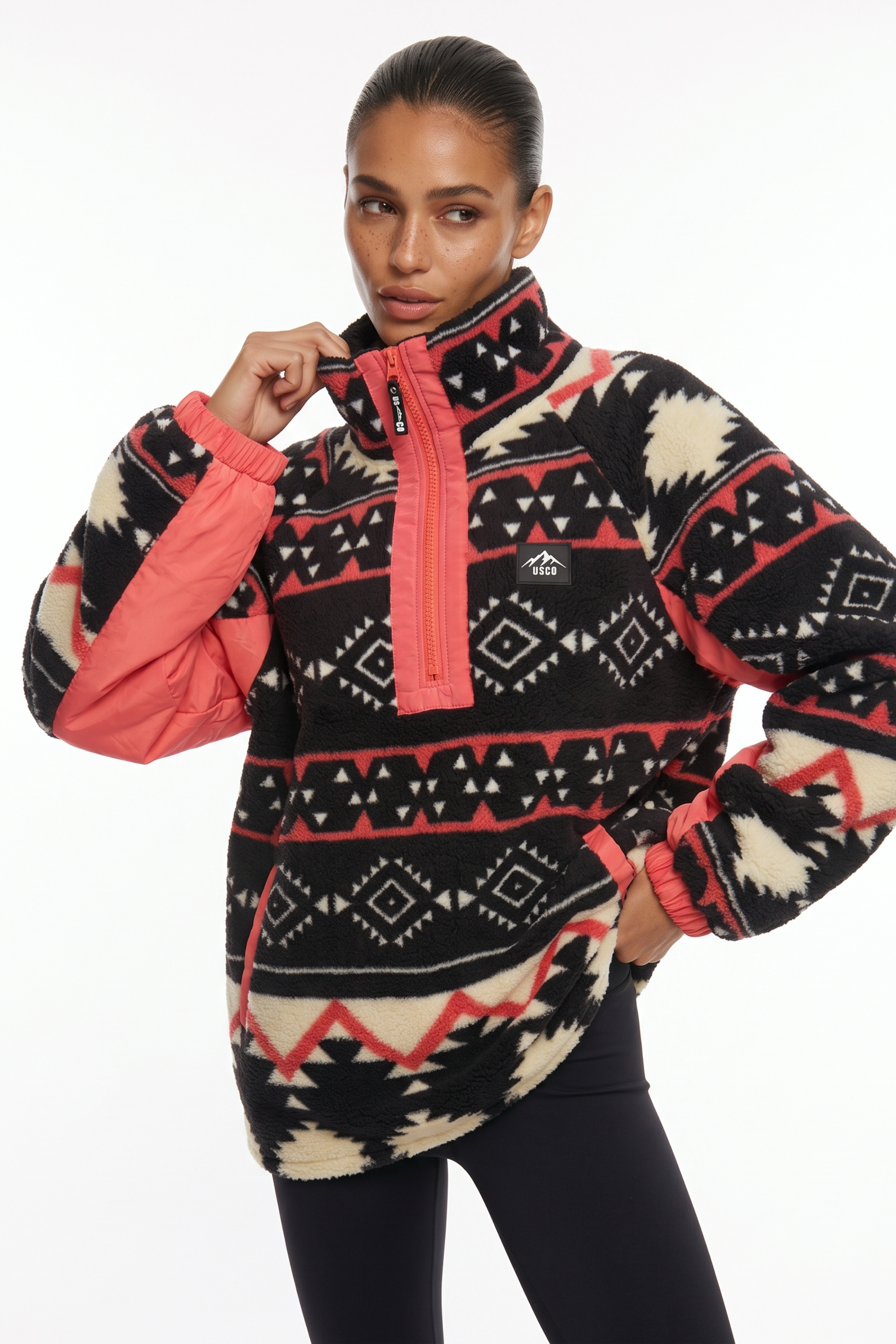 THE ARCTIC FLEECE IN CORAL AZTEC