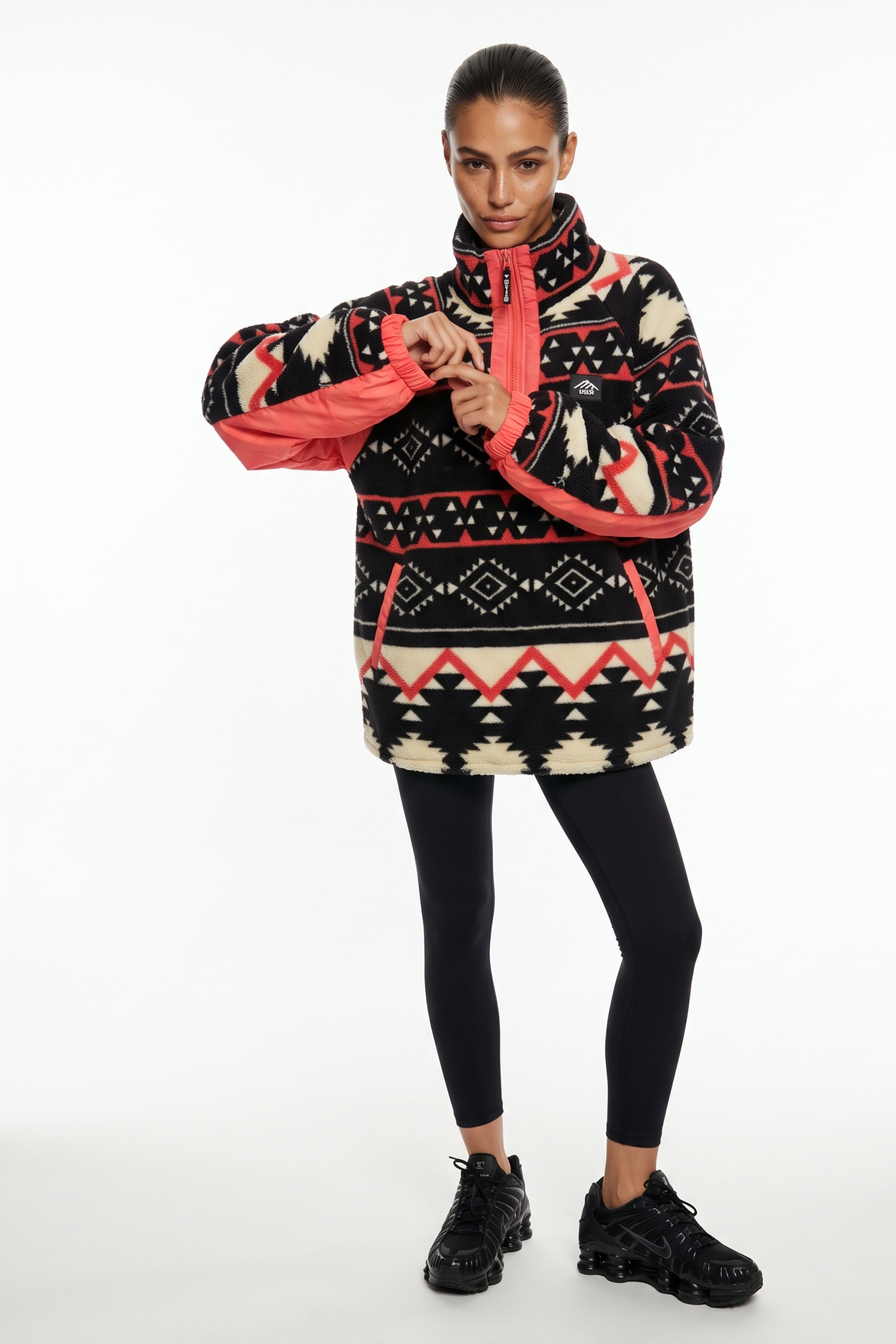 THE ARCTIC FLEECE IN CORAL AZTEC