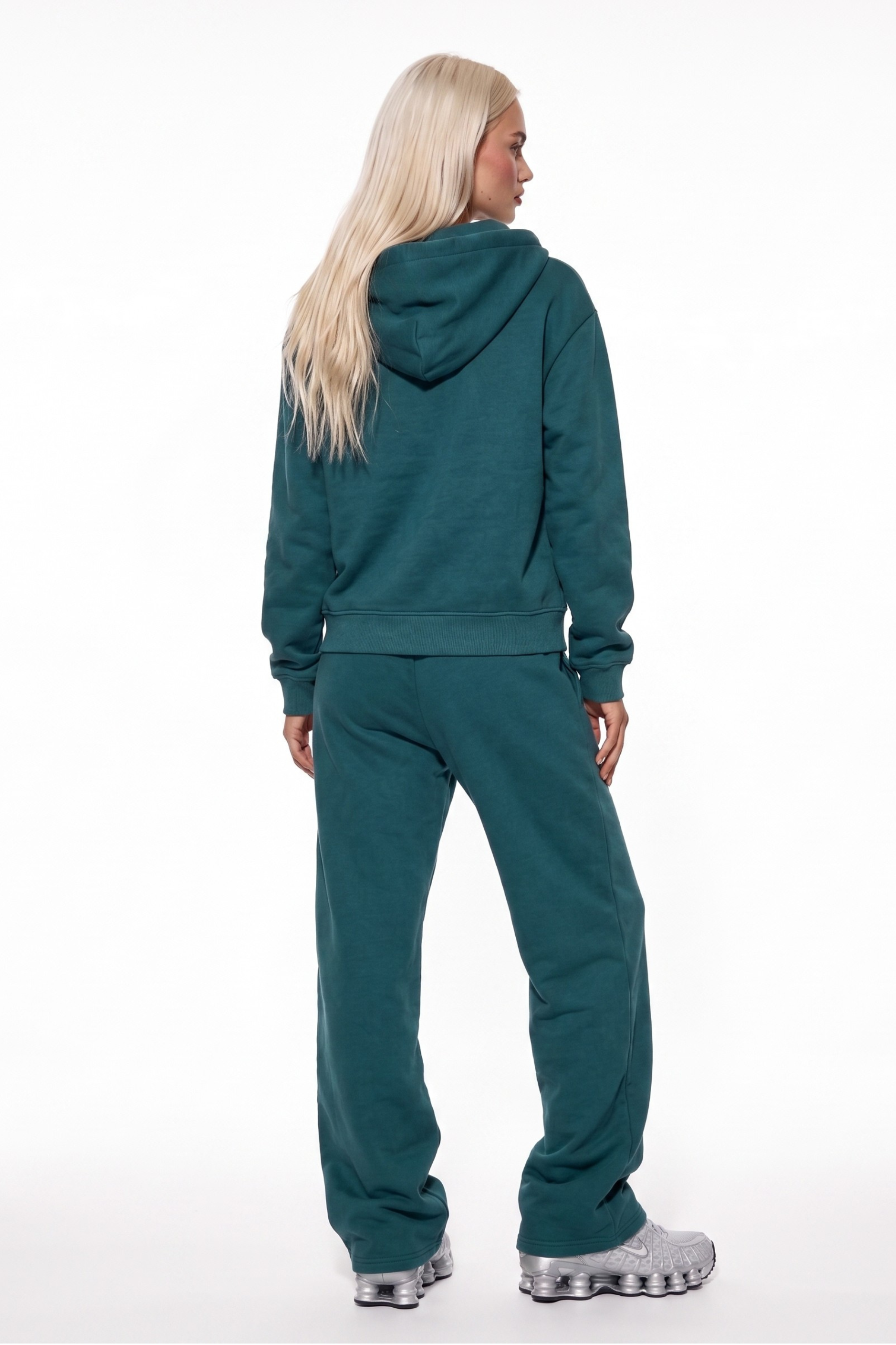 THE UNTAMED TRACKSUIT IN TEAL