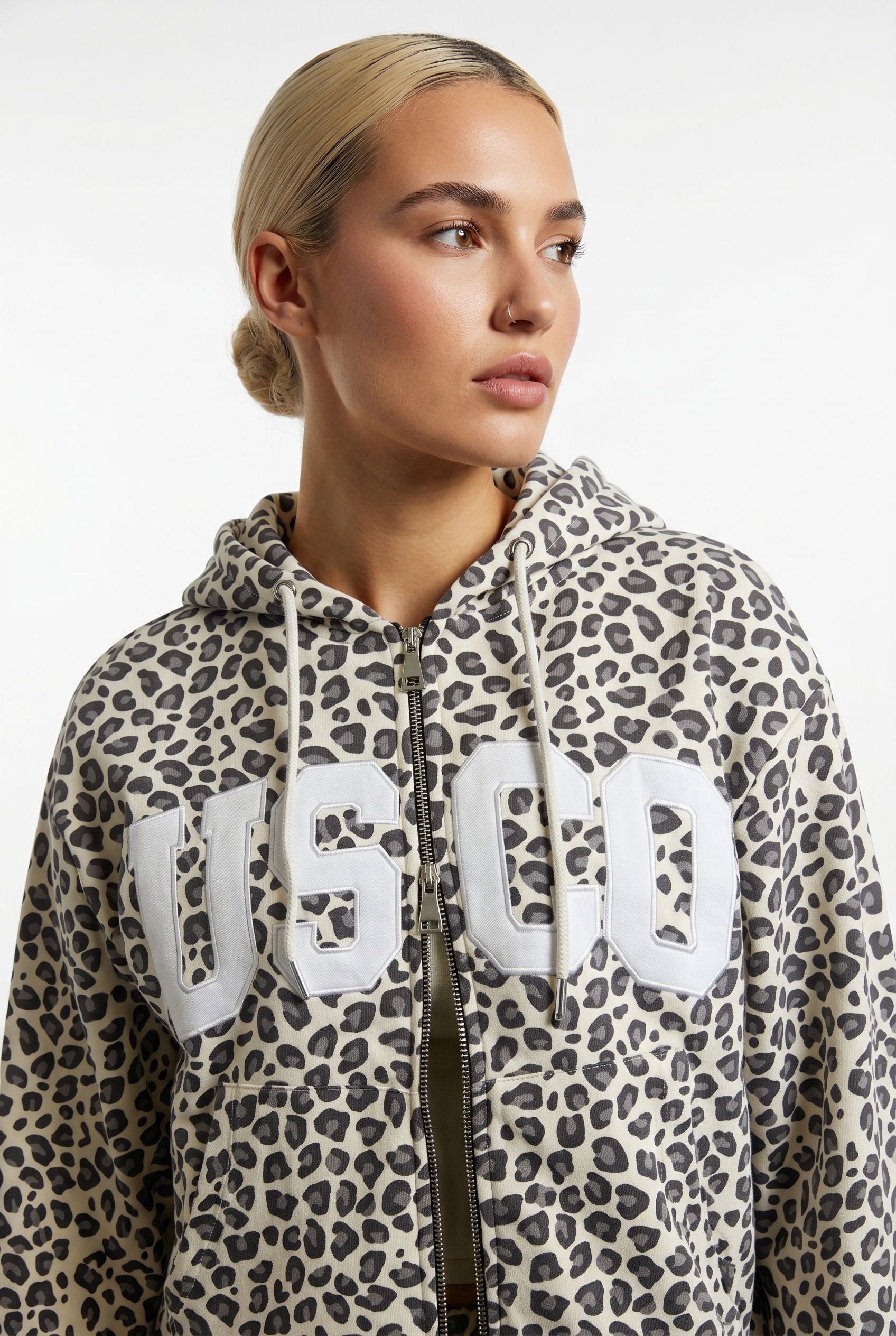 THE UNTAMED TRACKSUIT IN LEOPARD PRINT
