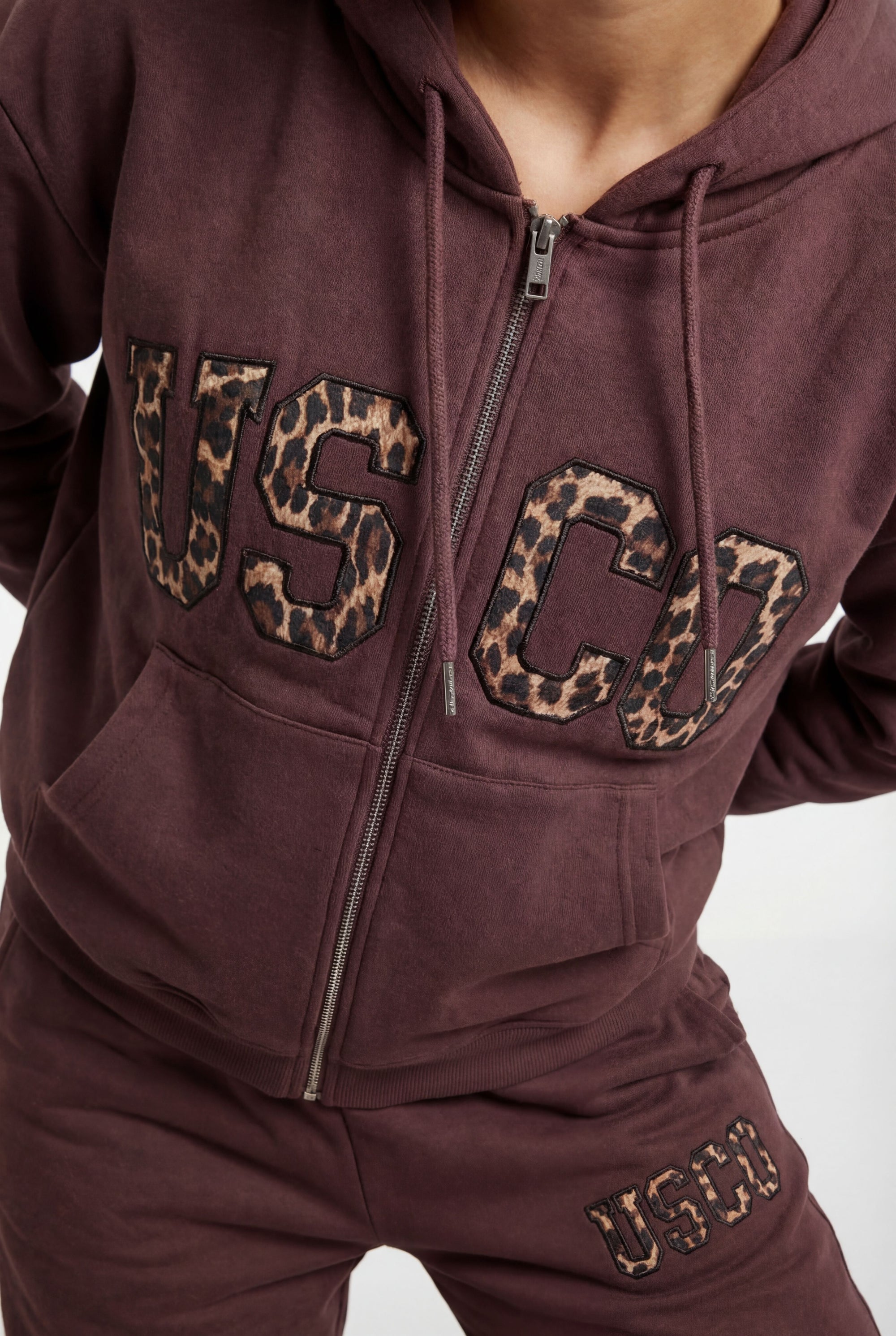 THE UNTAMED TRACKSUIT IN BROWN