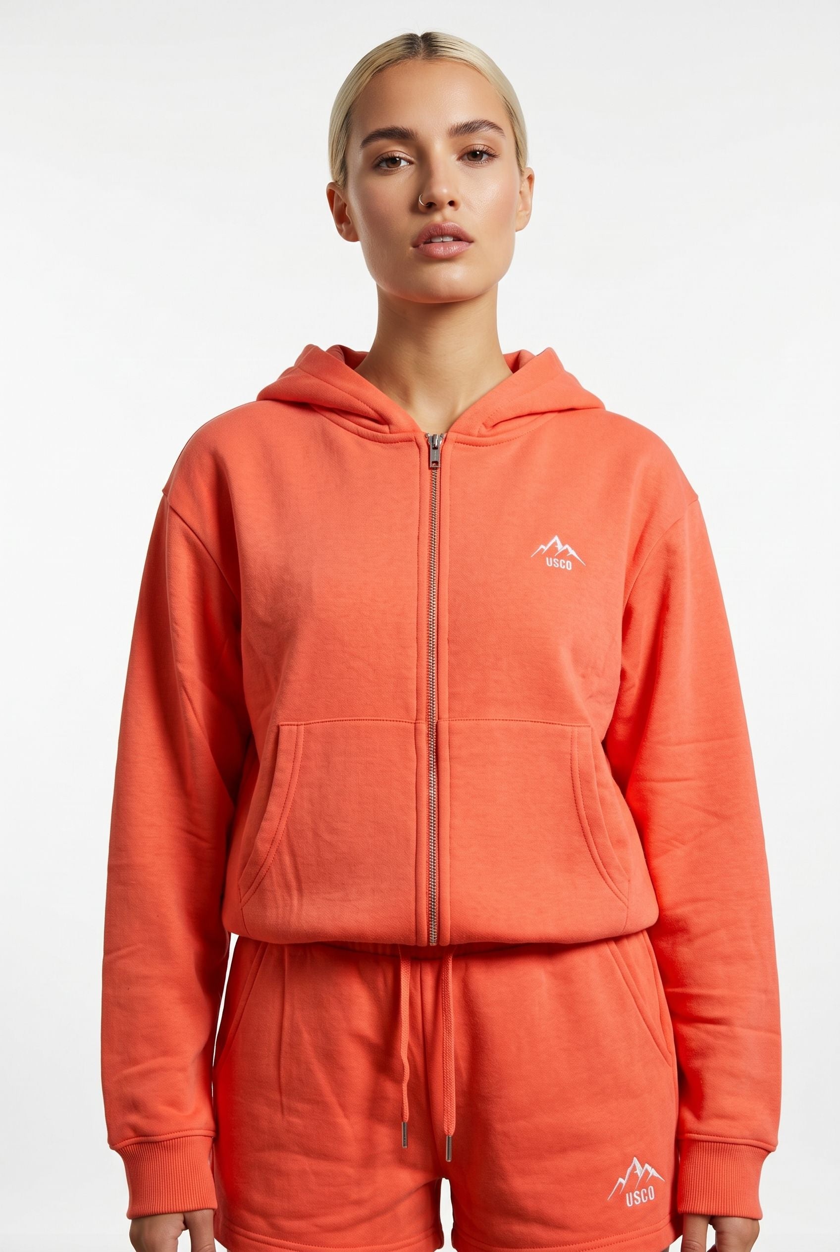 THE AURA SHORT SET IN CORAL
