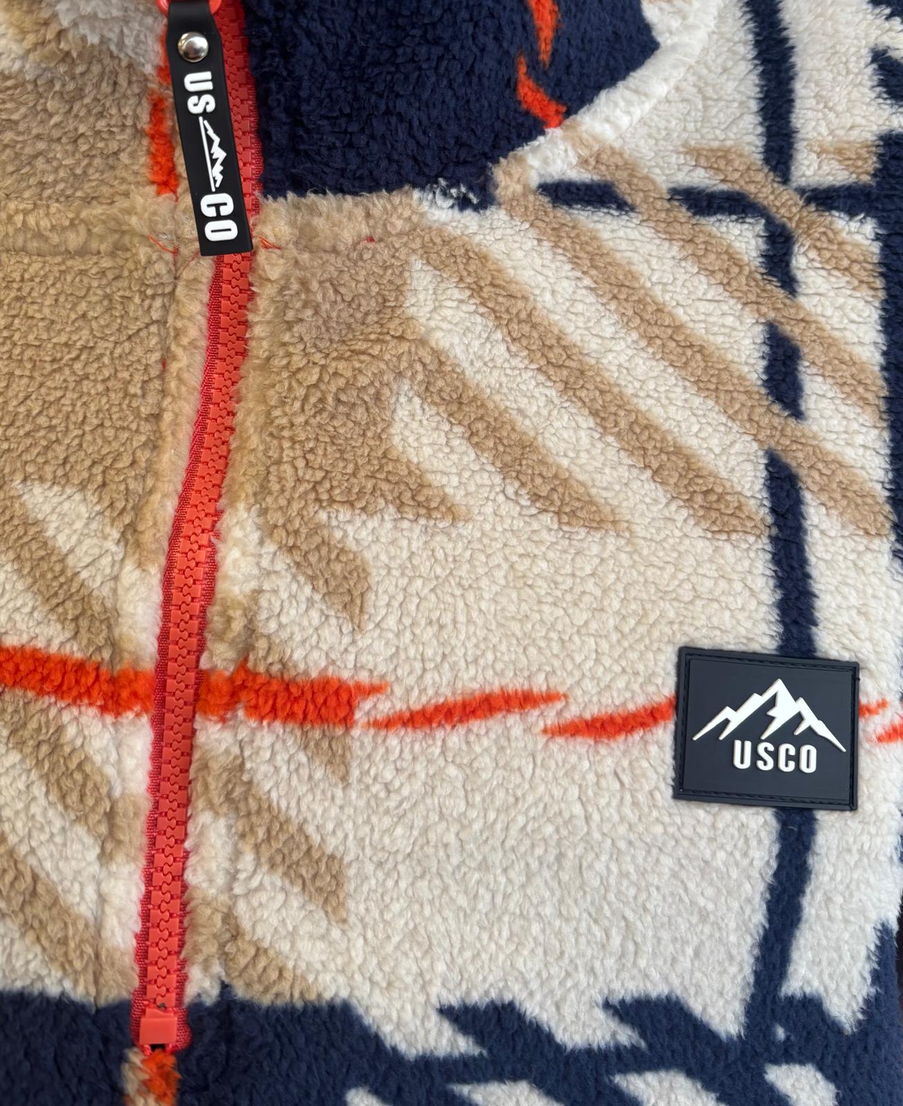 The Trek fleece in Geo Orange